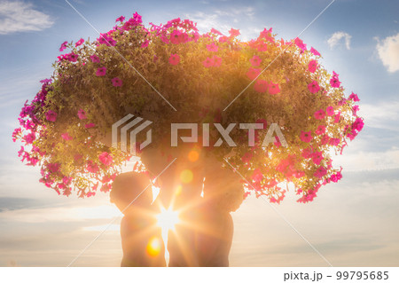 Delicate vase of flowers in a bloom, Luxembourg gardens at springtime, France 99795685