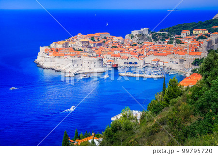 Dubrobvik old town, turquoise adriatic beach in Dalmatia, Croatia Dubrobvik old town, turquoise adriatic beach in Dalmatia, Croatia 99795720
