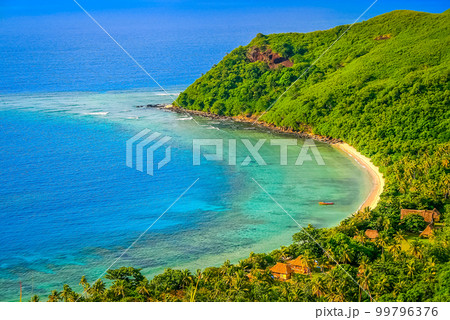 Tropical sandy beach at summer day in Fiji Islands, Pacific ocean 99796376