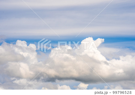 clouds and blue sunny sky, white clouds over blue sky, Aerial view, nature blue sky white cleat weather. clouds and blue sunny sky, white clouds over blue sky, Aerial view, nature blue sky white cleat weather. 99796528