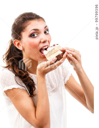 Woman eating the cake 99799396