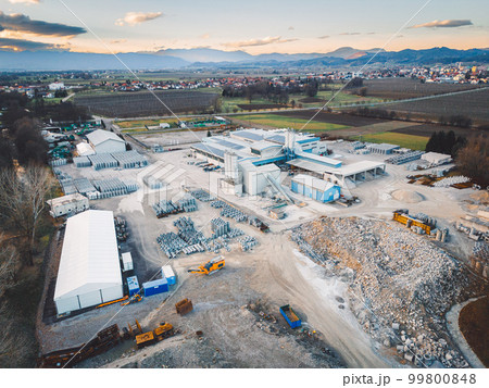 Aerial view of large storage site of construction firm in the suburbs Aerial view of large storage site of construction firm in the suburbs 99800848
