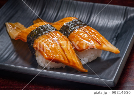 Japanese style of sushi with eel fish on plate Japanese style of sushi with eel fish on plate 99814650