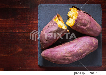 Japanese roasted sweet potato, yaki imo on wooden 99814656