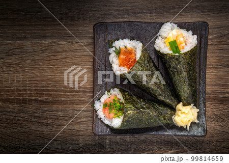 Japanese style of temaki with shrimp, caviar, fish 99814659