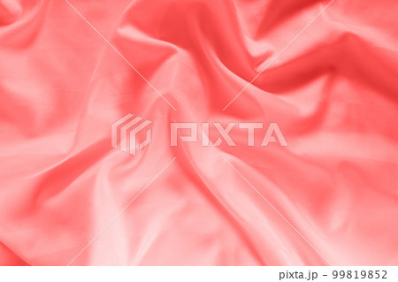 Abstract pink fabric background, satin stripe texture, wavy folds of elegant expensive fabric Abstract pink fabric background, satin stripe texture, wavy folds of elegant expensive fabric 99819852