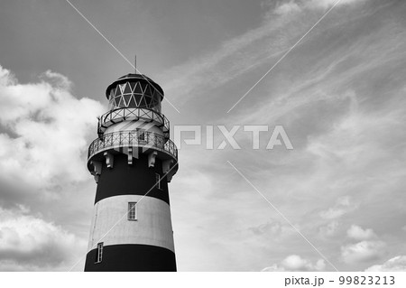 Black and white photo of a lighthouse against the sky 99823213