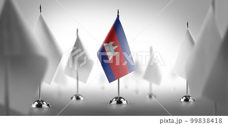 The national flag of the Cambodia surrounded by white flags 99838418