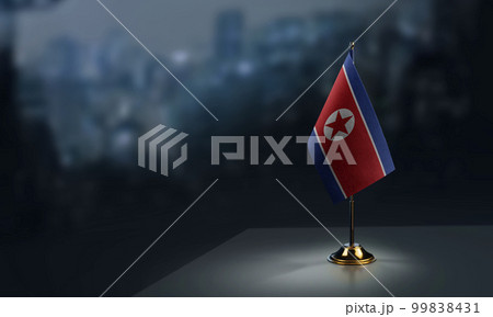 Small flags of the North Korea on an abstract blurry background Small flags of the North Korea on an abstract blurry background 99838431