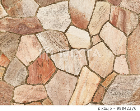 明るい薄茶色の乱張りした乱形の敷石の表面の背景画像 明るい薄茶色の乱張りした乱形の敷石の表面の背景画像 99842276