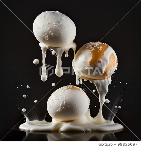 appetizing tasty white balls of mozzarella cheese on a black background close-up. 99856097