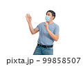 Asian man wearing a mass gesture 99858507