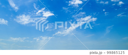 Blue sky with cirrus clouds. Wide photo. 99865125