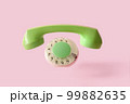The handset and disc of an old retro phone on a pink background with the absence of the device 99882635