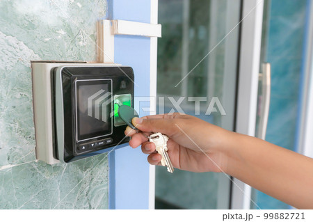 Proximity card reader door unlock, using ID card on fingerprint scanning access control system for identity verification to open the door. 99882721