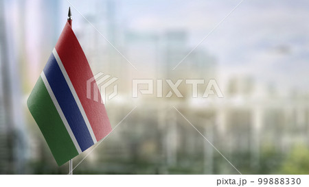 Small flags of the Gambia on an abstract blurry background Small flags of the Gambia on an abstract blurry background 99888330