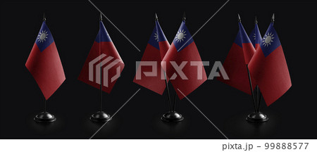 Small national flags of the Taiwan on a black background 99888577