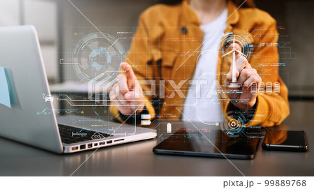 ESG concept of environmental, Green ethical business preserving resources, reducing CO2, Business person team working on laptop virtual smartphone to reduce CO2 emissions carbon . ESG concept of environmental, Green ethical business preserving resources, reducing CO2, Business person team working on laptop virtual smartphone to reduce CO2 emissions carbon . 99889768