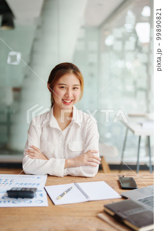 data analysis, plan, marketing, accounting, audit, Portrait of asian business woman planning marketing using statistical data sheet and computer to present marketing plan project at meeting 99890821