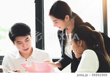 Start-up Business, a team of young entrepreneurs working together to increase profits into the company to increase business potential. 99892900