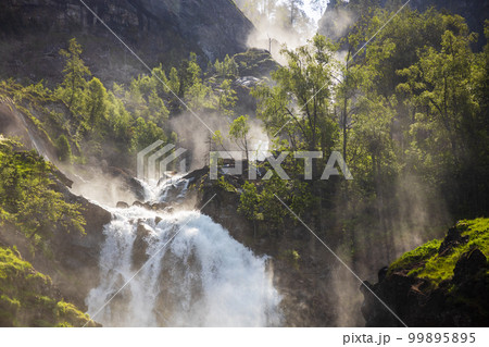 Latefossen is one of the most visited waterfalls in Norway and is located near Skare and Odda in the region Hordaland, Norway. Consists of two separate streams flowing down from the lake Lotevatnet. Latefossen is one of the most visited waterfalls in Norway and is located near Skare and Odda in the region Hordaland, Norway. Consists of two separate streams flowing down from the lake Lotevatnet. 99895895