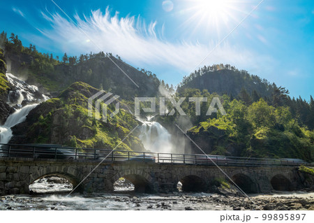 Latefossen is one of the most visited waterfalls in Norway and is located near Skare and Odda in the region Hordaland, Norway. Consists of two separate streams flowing down from the lake Lotevatnet. Latefossen is one of the most visited waterfalls in Norway and is located near Skare and Odda in the region Hordaland, Norway. Consists of two separate streams flowing down from the lake Lotevatnet. 99895897