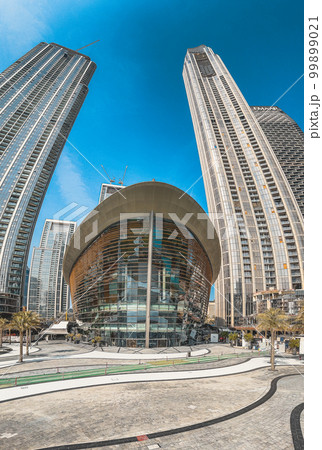 Dubai Opera house in Downtown Dubai, surrounded by skyscrapers and Burj Khalifa, in UAE, United Arab Dubai Opera house in Downtown Dubai, surrounded by skyscrapers and Burj Khalifa, in UAE, United Arab 99899021
