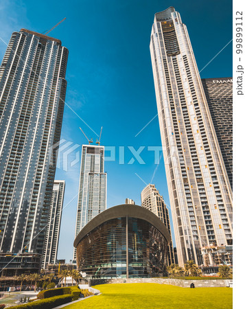 Dubai Opera house in Downtown Dubai, surrounded by skyscrapers and Burj Khalifa, in UAE, United Arab 99899112