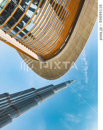Dubai Opera house in Downtown Dubai, surrounded by skyscrapers and Burj Khalifa, in UAE, United Arab 99899116