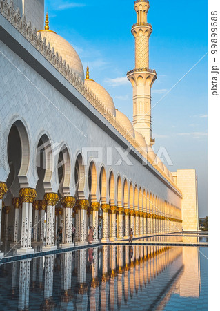 Sheikh Zayed Grand Mosque hallway corridor during sunset, in Abu Dhabi, United Arab Emirates Sheikh Zayed Grand Mosque hallway corridor during sunset, in Abu Dhabi, United Arab Emirates 99899688