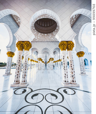 Sheikh Zayed Grand Mosque hallway corridor during sunset, in Abu Dhabi, United Arab Emirates Sheikh Zayed Grand Mosque hallway corridor during sunset, in Abu Dhabi, United Arab Emirates 99899768