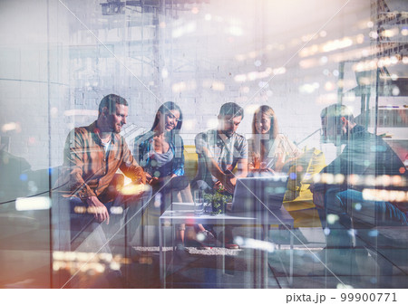 People work together in a modern office as teamwork and partner. Double exposure 99900771