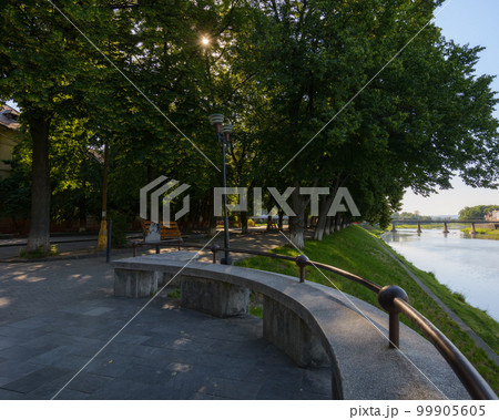 river waterfront in morning light. downtown of uzhhorod, ukraine. popular travel destination river waterfront in morning light. downtown of uzhhorod, ukraine. popular travel destination 99905605
