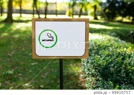 Designated smoking area sign in public. Horizontal banner. 99910757