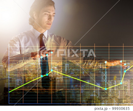 Businessman controlling the market with strings 99930635