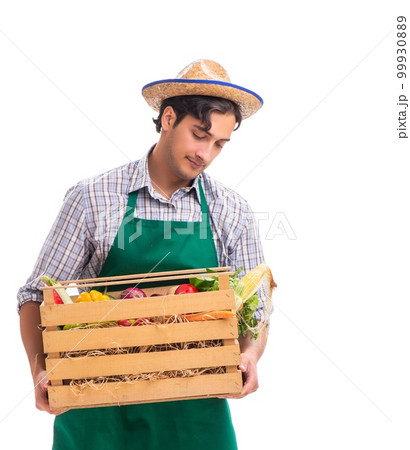 Young farmer with fresh produce isolated on white background Young farmer with fresh produce isolated on white background 99930889