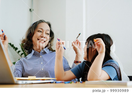 Asian portrait, grandchild granddaughter grandma grandmother and granddaughter happily join in activities to enhance skills for grandchildren. 99930989