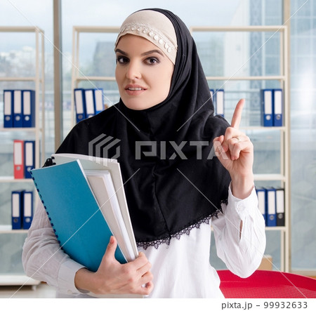 Woman muslim employee working in the office 99932633