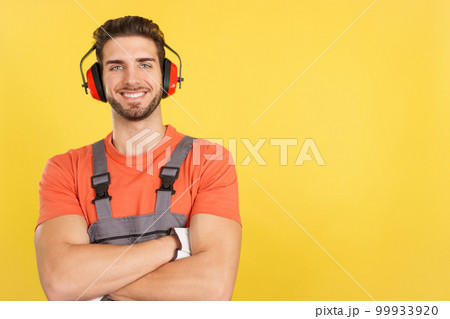 Friendly caucasian man carpentry worker in work uniform 99933920
