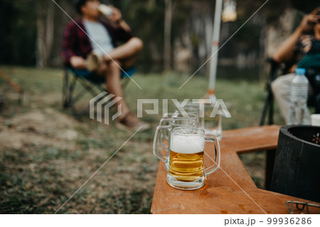 selective focus beer glass in the camping 99936286