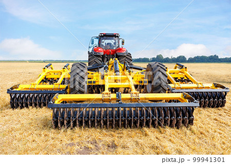 Toothed metal multi-row yellow harrow as a tractor hitch for agricultural processing of fields. 99941301