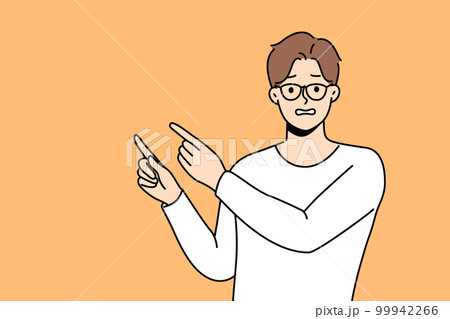 Frustrated man point at empty space Frustrated man point at empty space 99942266