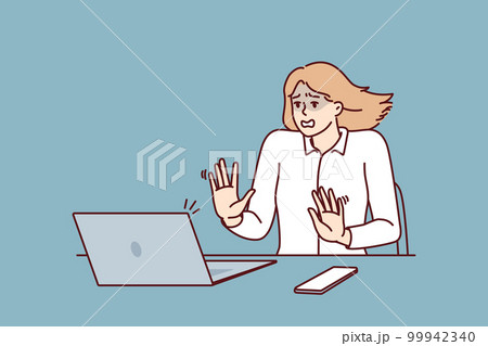 Frightened businesswoman looking at laptop after seeing cash gap notice in own company Frightened businesswoman looking at laptop after seeing cash gap notice in own company 99942340
