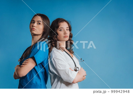 Portrait of young medical staff, studio shoot. 99942948