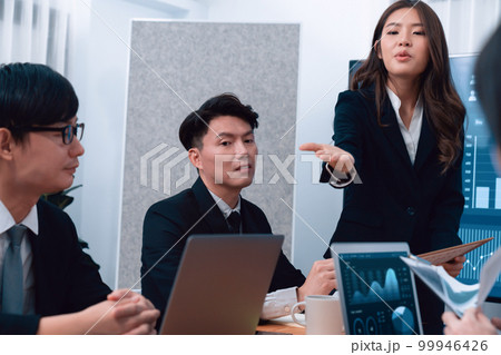 Businesswoman give presentation on dashboard data on screen at harmony office. 99946426