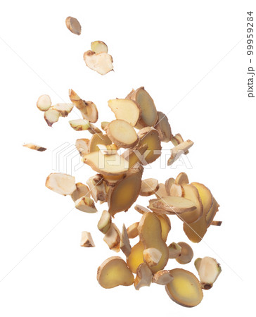 Galangal mix Ginger fall fly in mid air, fresh vegetable spice ginger galangal falling. Organic fresh herbal ginger galangal root head cut chop slice. White background isolated freeze motion 99959284