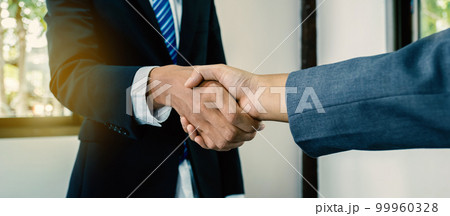 hands shake after business office executives are interviewing job applicants in the meeting room 99960328