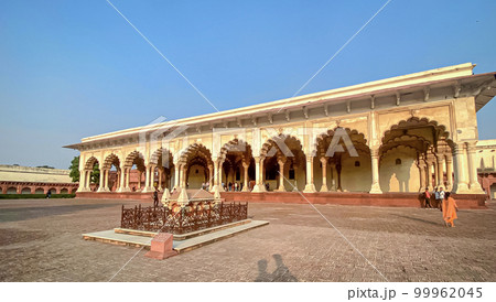 The famous red fort in the city of Agra, India. Tourists visit a popular tourist attraction. 99962045