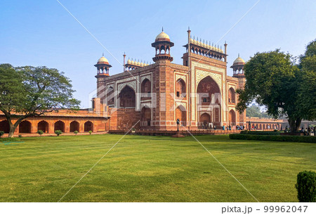 The famous red fort in the city of Agra, India. Tourists visit a popular tourist attraction. The famous red fort in the city of Agra, India. Tourists visit a popular tourist attraction. 99962047