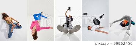 Collage. Young man and woman in bright stylish clothes isolated over grey background. Inner world, psychology Collage. Young man and woman in bright stylish clothes isolated over grey background. Inner world, psychology 99962456